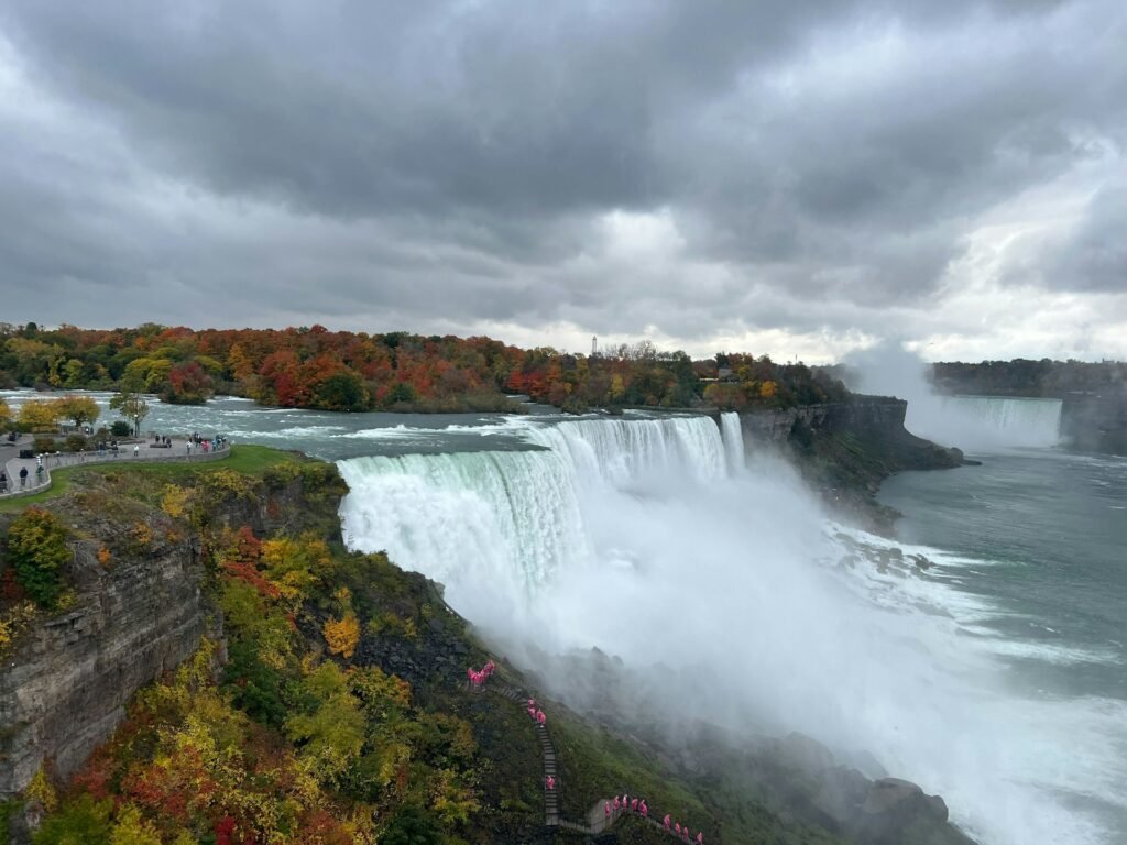 Niagara falls with autumn foliage backdrop