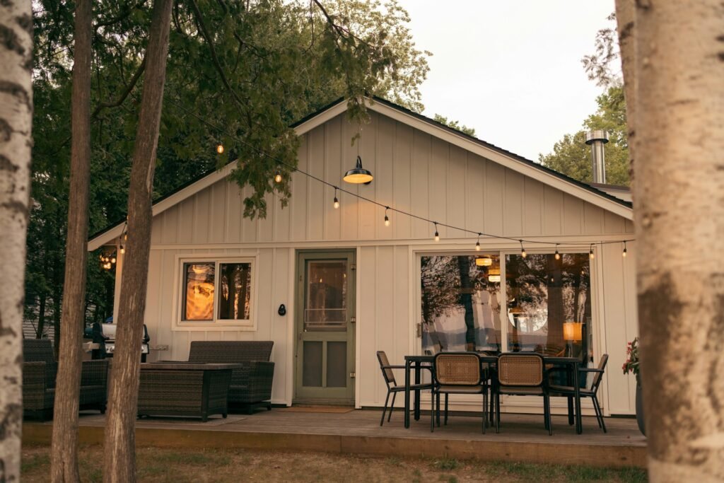 Cozy house with outdoor seating area.