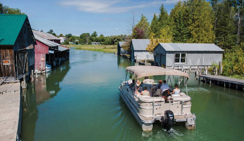 Boat navigating through a serene waterway.
